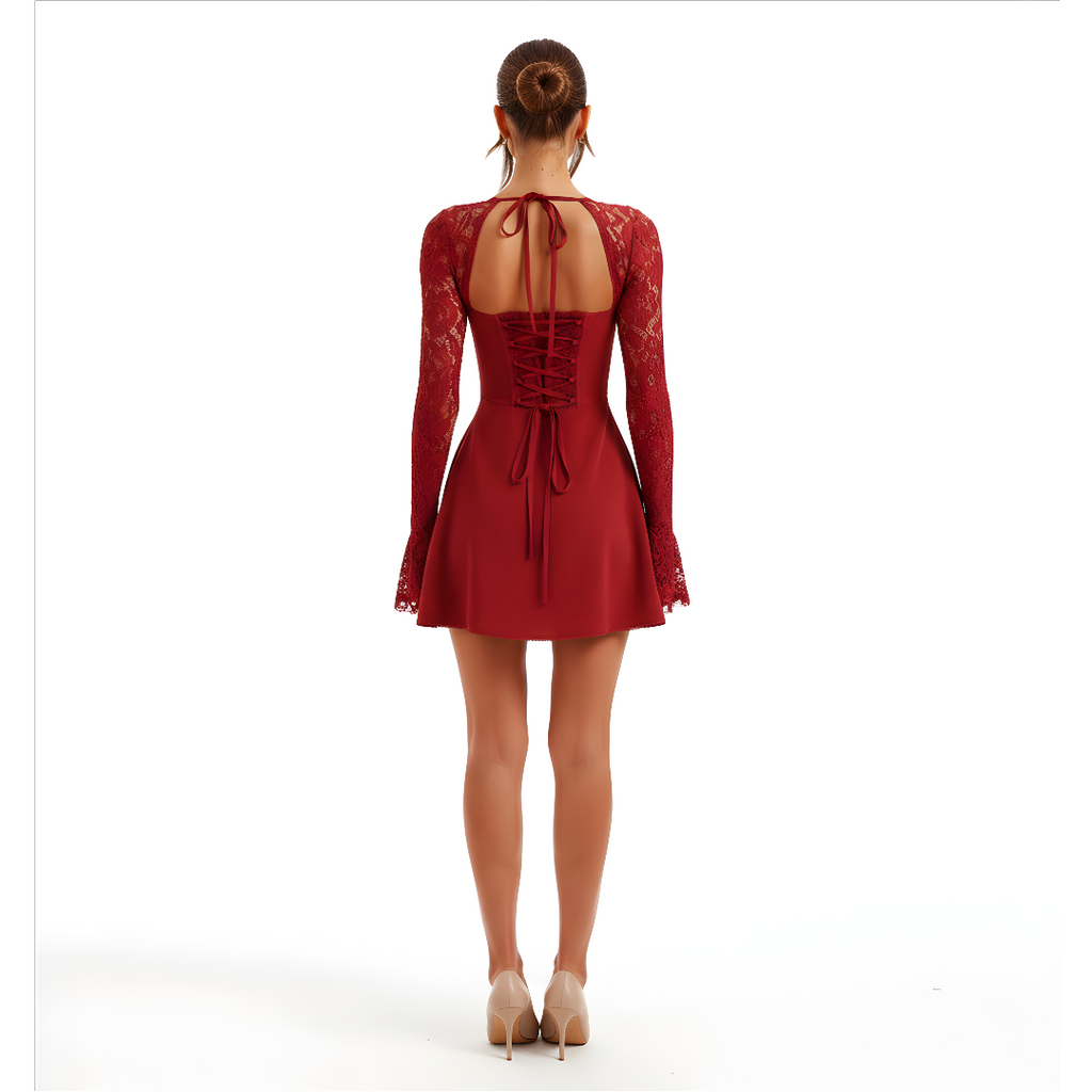 Red lace dress with long sleeves and open back on a white background